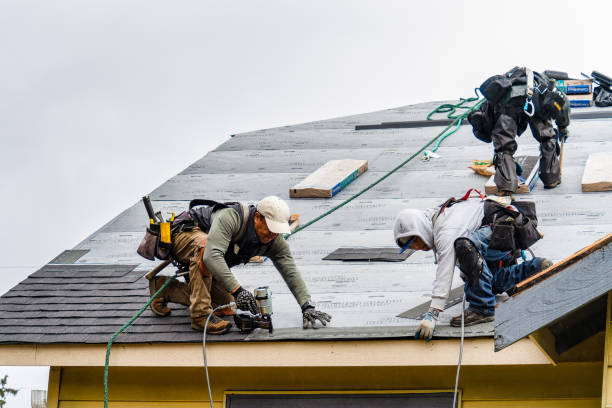 Professional Gutter Installation technician working in Wheeler, OR